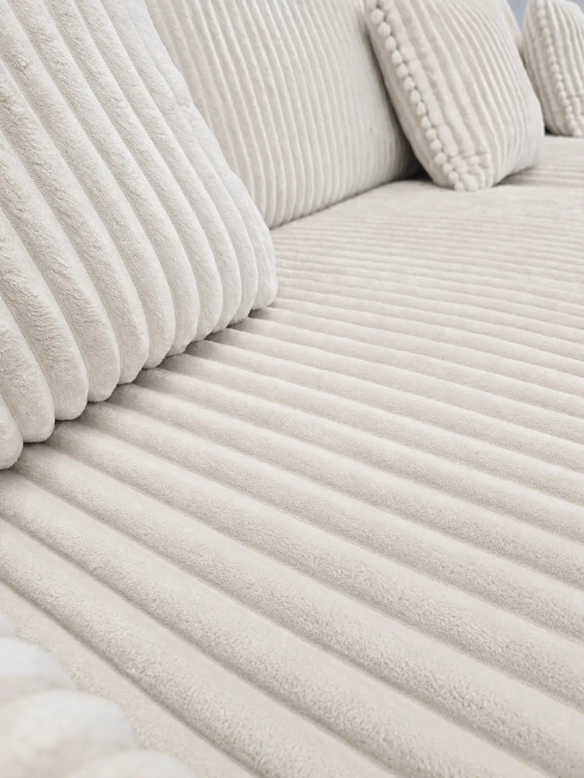 Canapé d’angle Alaïa velours côtelé beige